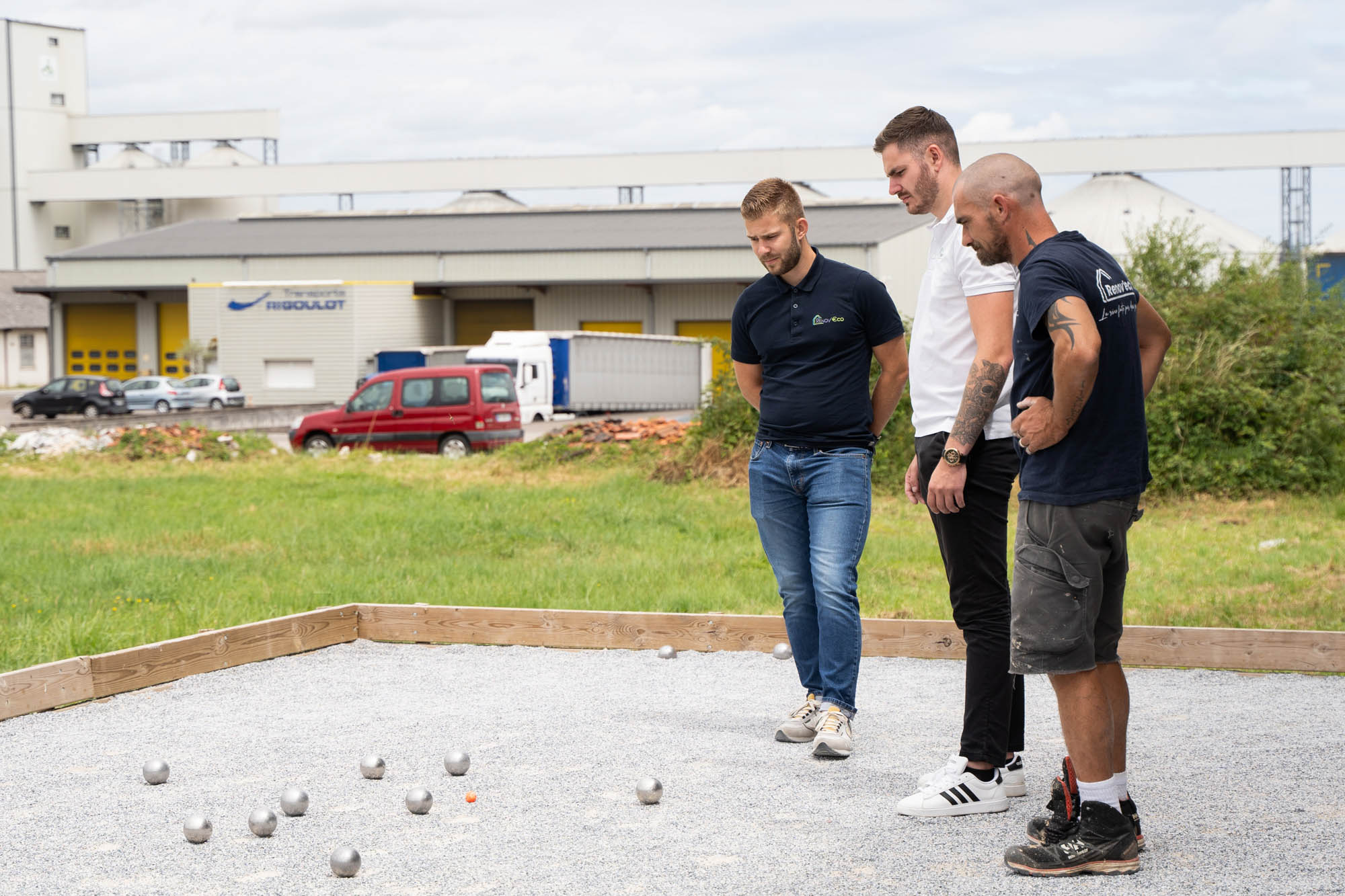 a group of men standing outside